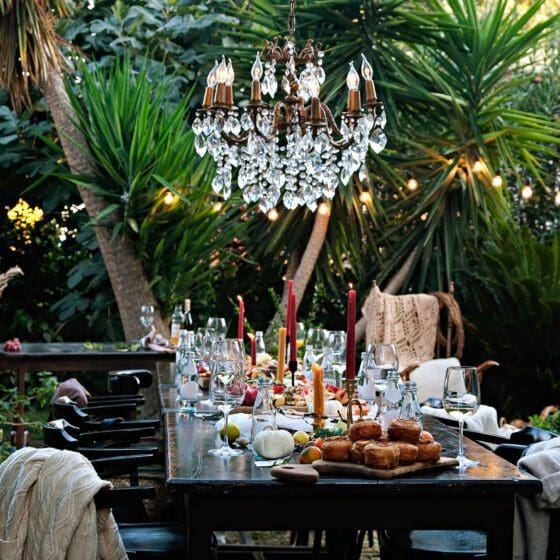 Banquet table setting and arrangement. Holiday table beautifully set with floral decoration. Beautiful event staged by Private Maui Chef.