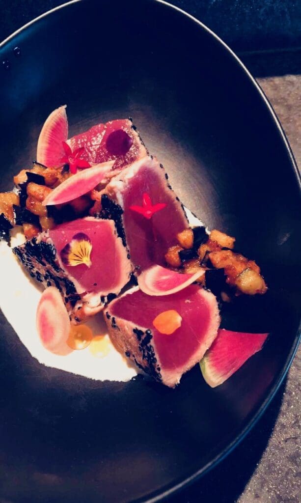 Black Sesame seared Ahi, Lilikoi beure blanc, miso eggplant and tofu, watermelon radish